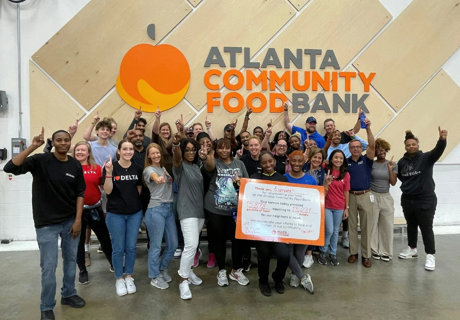 Employees give back to their community by volunteering at the Atlanta Community Food Bank.