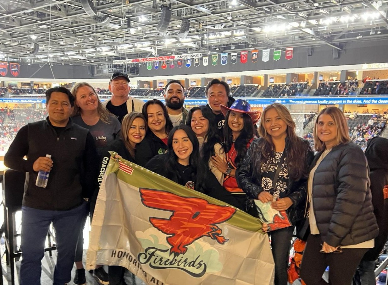 The Acacia Health team celebrating at a local hockey game.