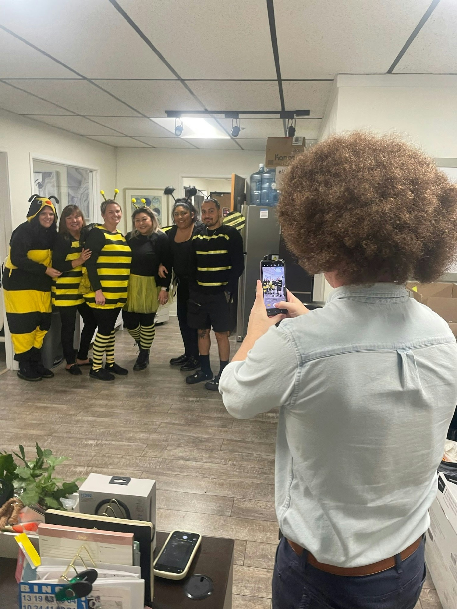 Bob Ross and the Busy Bees celebrating Halloween in Acacia's office.