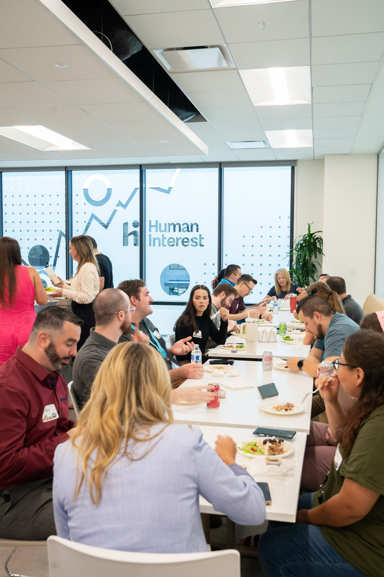 Employees partaking in shared community meals. 