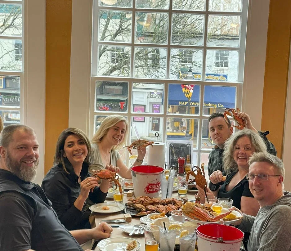 Our intra-office ESOP committee samples famous Maryland crabs while learning about our employee ownership culture. 