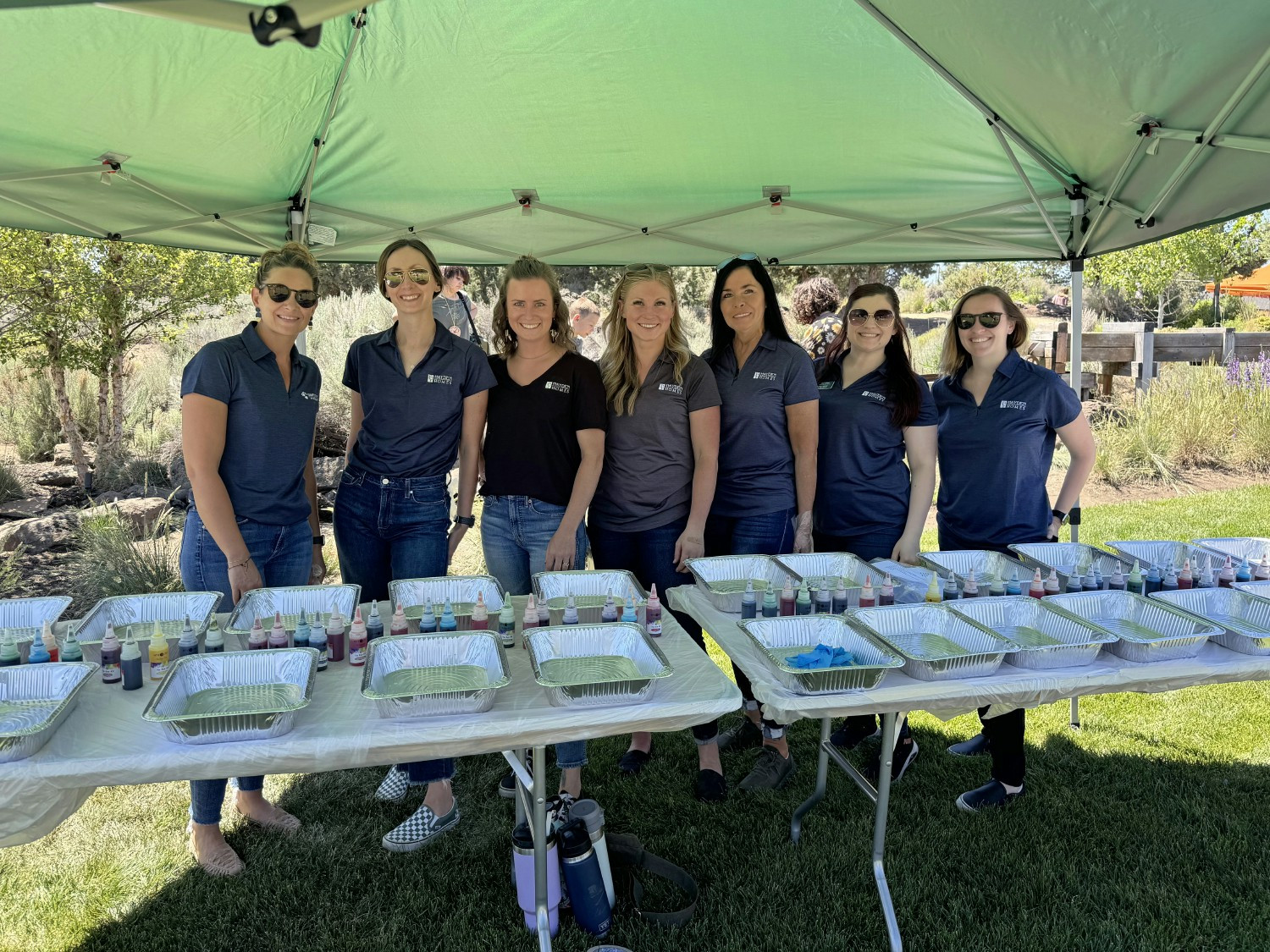 Team members volunteering at Camp Courage, a grief camp put on by nonprofit Clear Mourning.