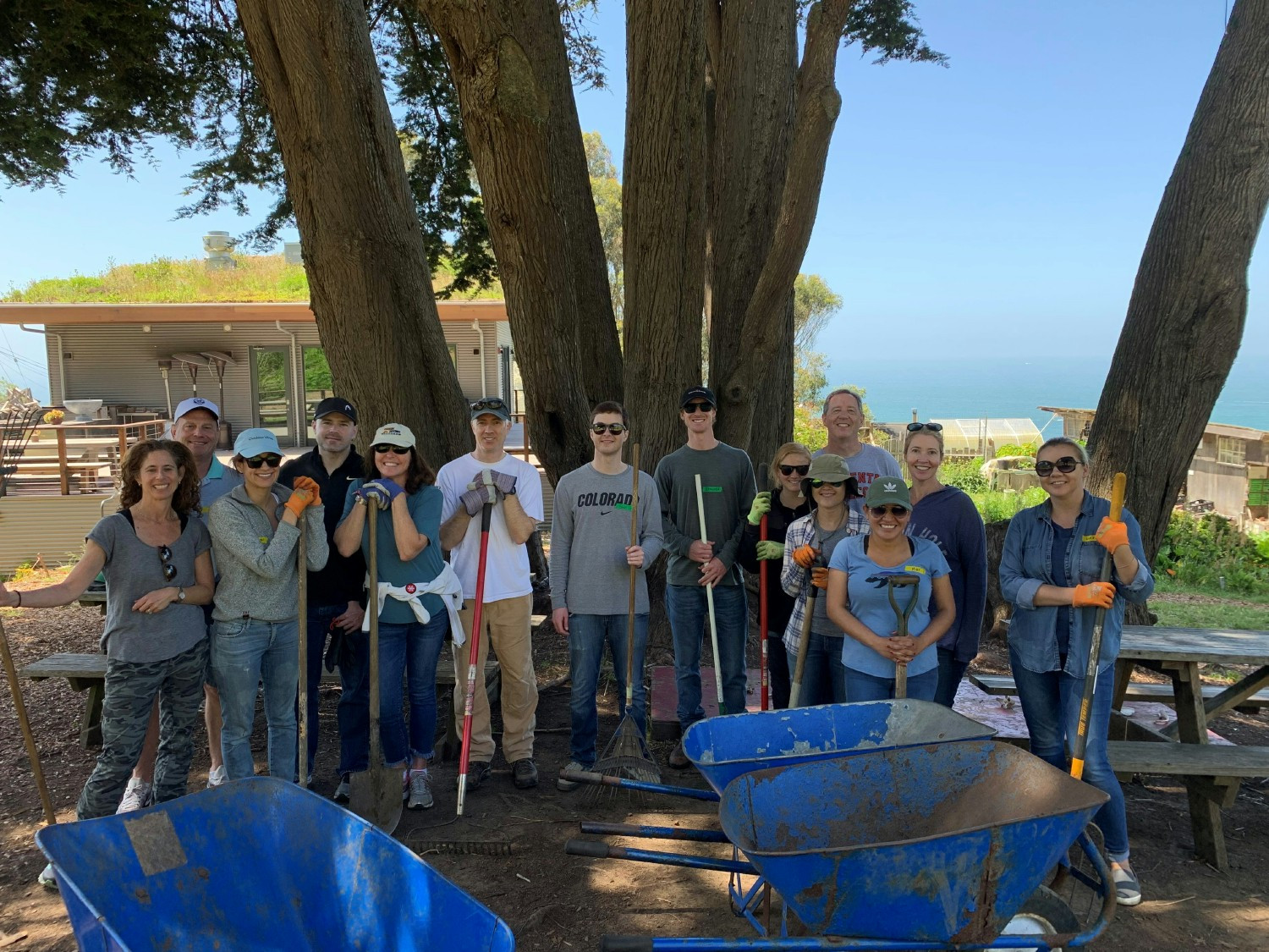 Gilmartin employees giving back to the local community in the Bay Area, supporting environmental conservation efforts.