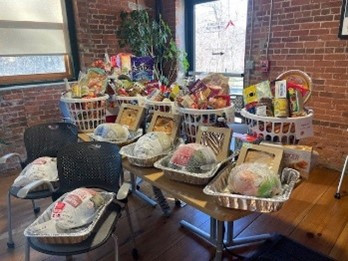 Assisting families in need by contributing Thanksgiving baskets to a local organization. 