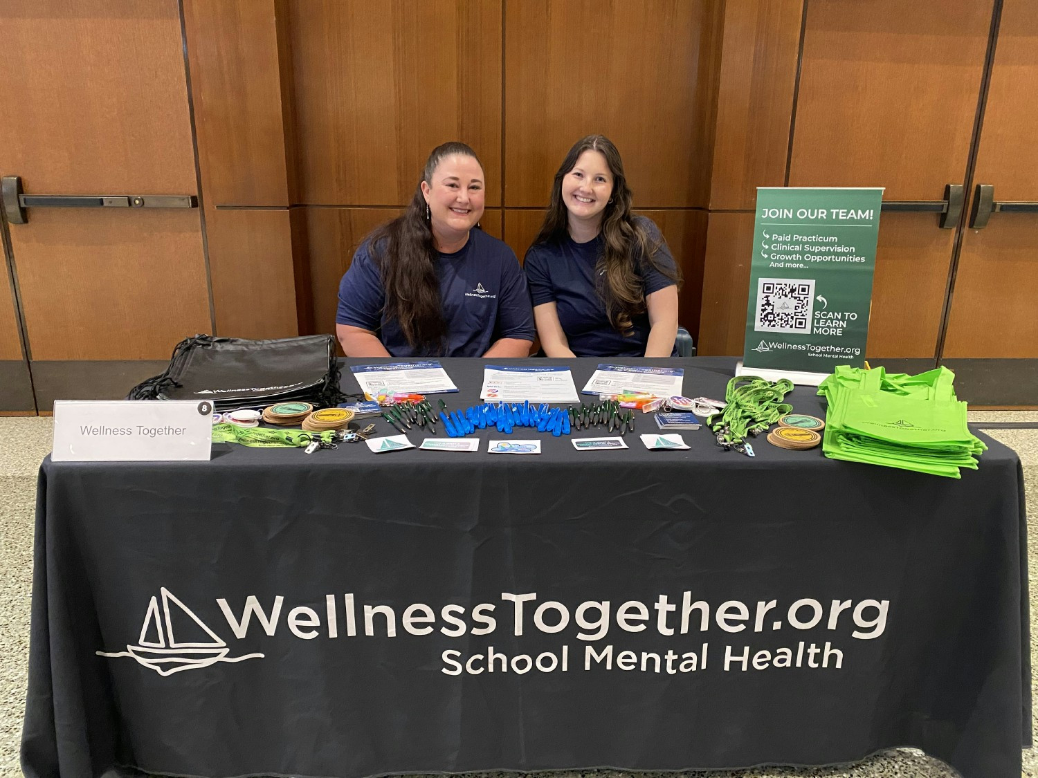 Wellness Together at a recruitment event, connecting with the next generation of mental health providers.