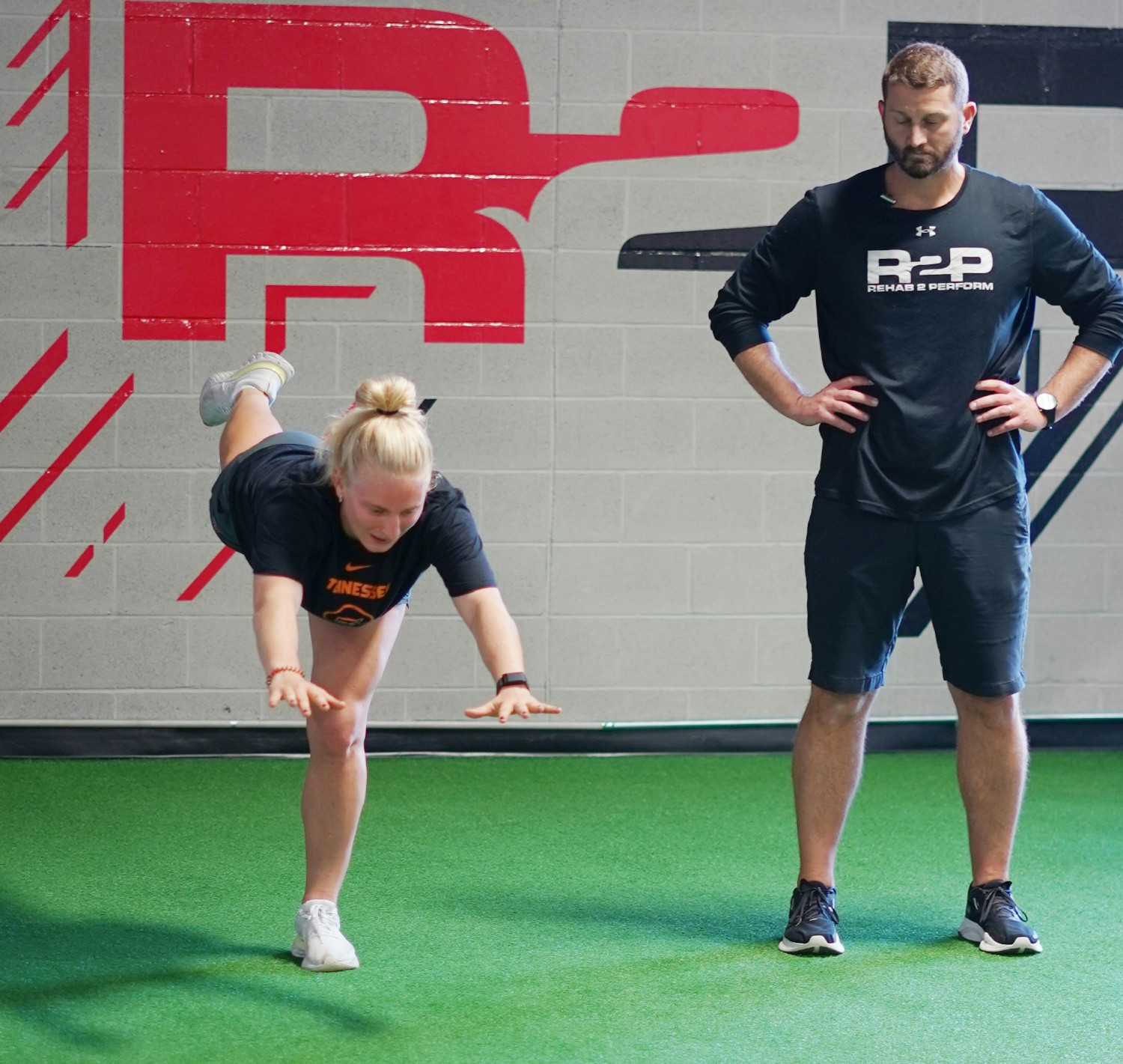 Dr. Zach working with a high school student-athlete during her injury recovery. 