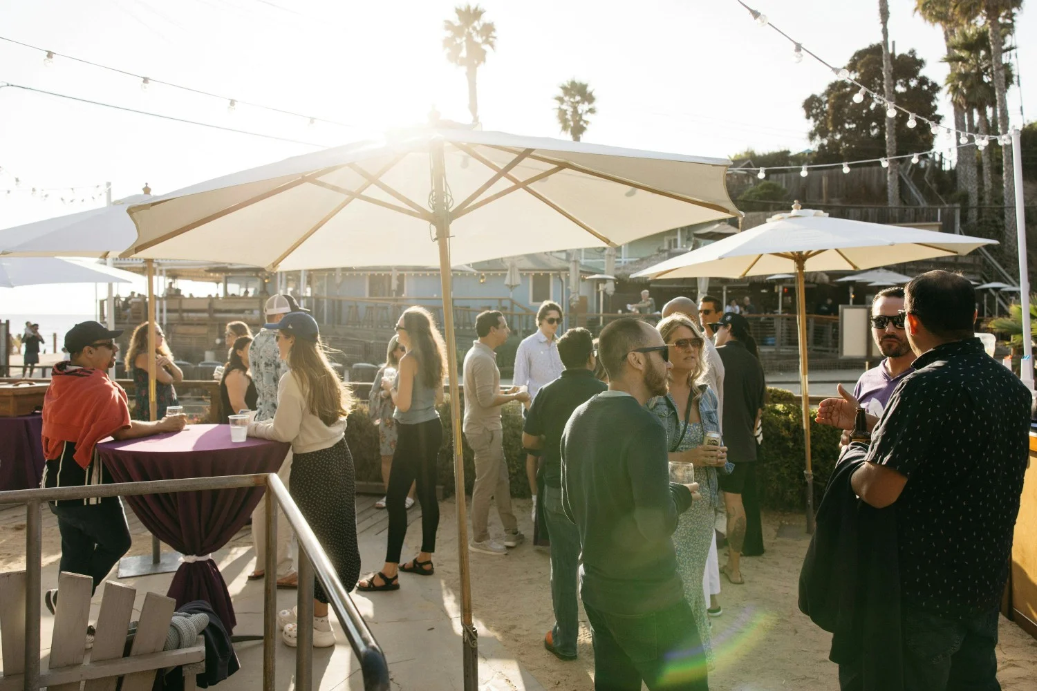 Employees enjoying a beachside event at Crystal Cove, Laguna Beach CA
