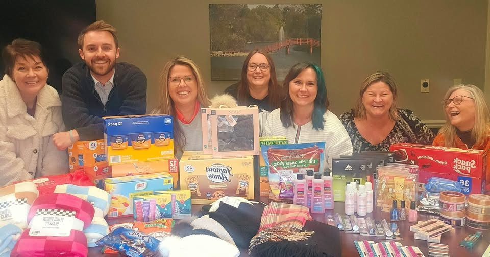 Janesville office gives back with a holiday donation to Project 16:49, aiding homeless teens in Rock County.