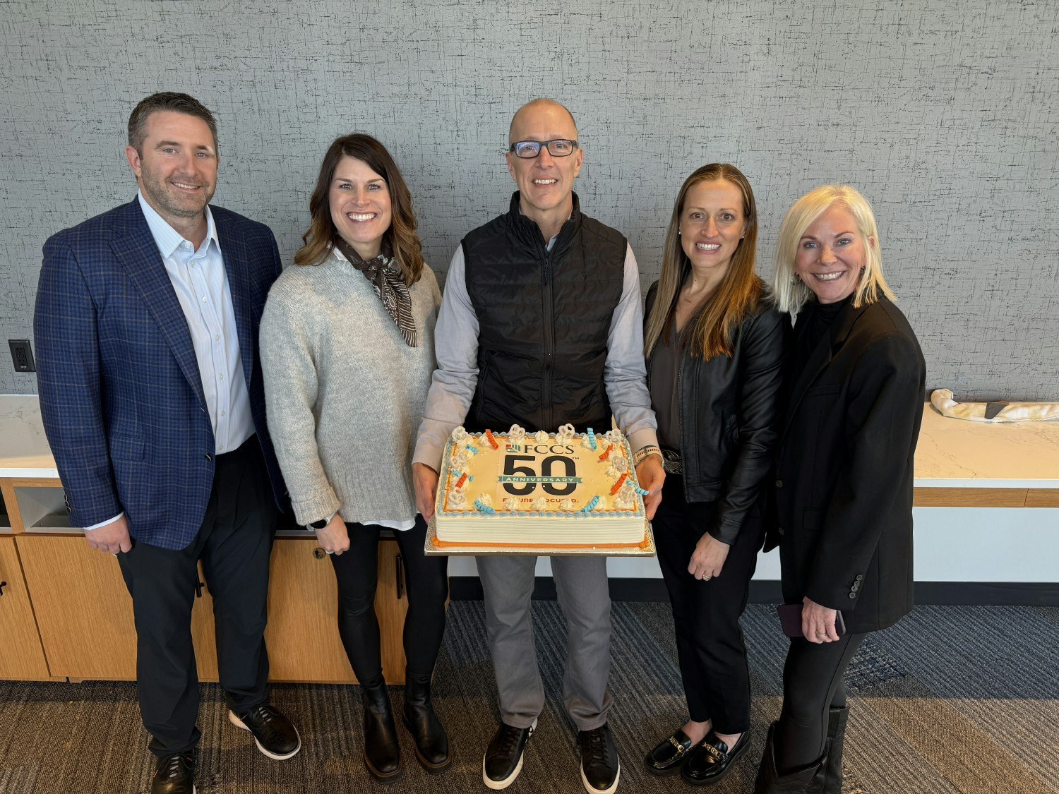 Here are several members of our executive team celebrating FCCS' 50th year in 2025!