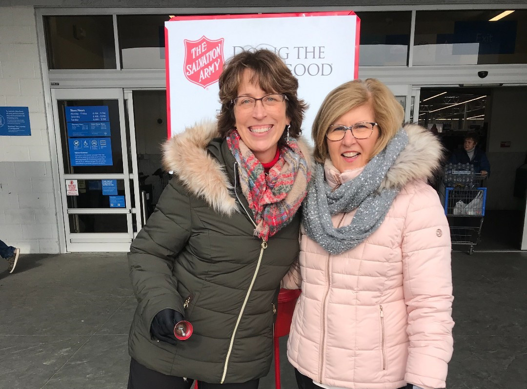 Employees volunteering to Ring the Bell for the Salvation Army. 