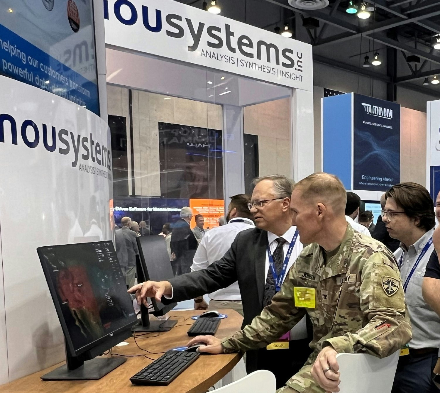 nSI engaging with the warfighter at a conference.