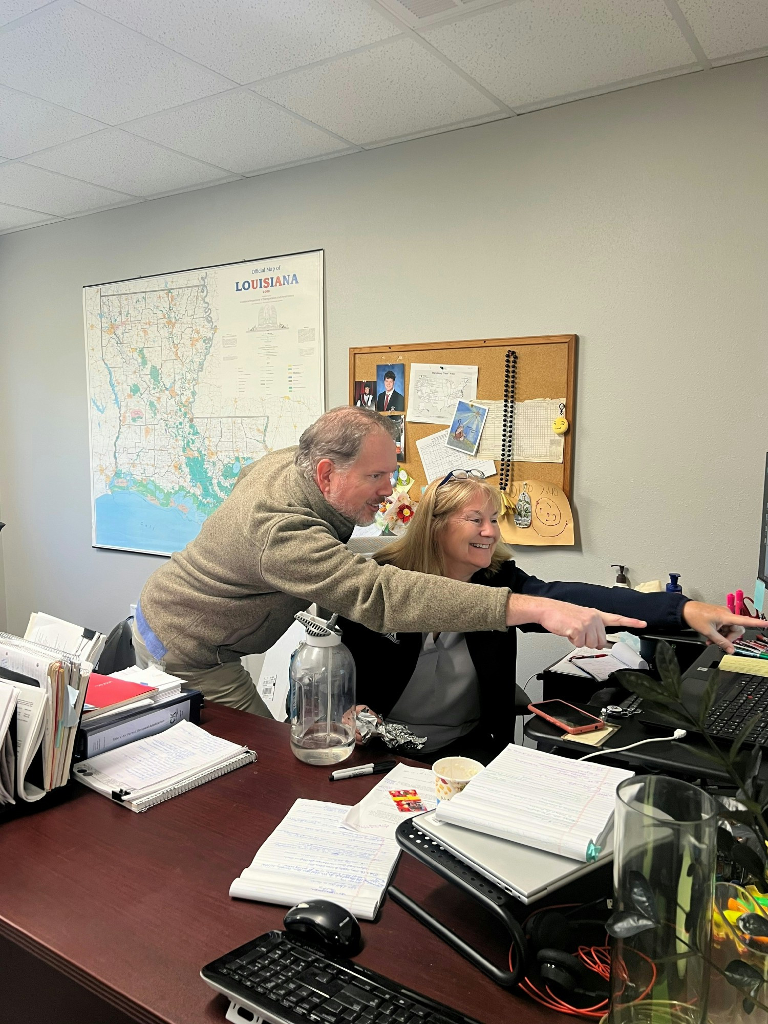 Employees being silly when I asked for a picture of them working.  