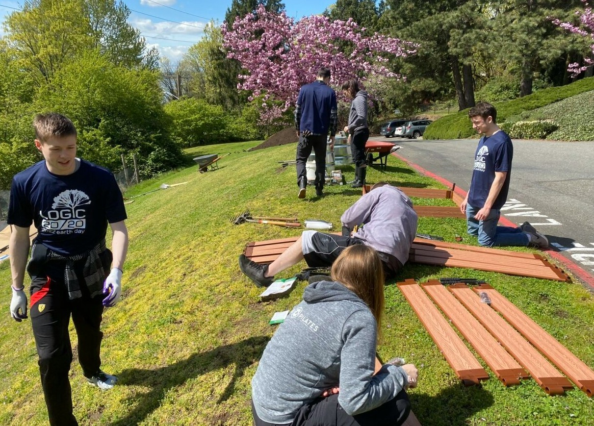 Logicians clean up a local park for Earth Day. Each employee receives 16 hours devoted to volunteering annually. 