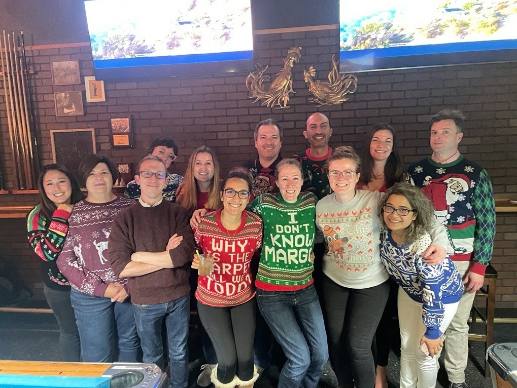 There’s nothing ugly about a little competition! Our team poses during our annual ugly sweater competition.