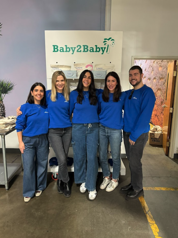 Coterie volunteering with Baby2Baby, a longterm impact partner