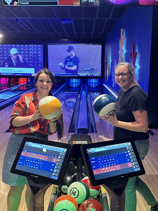 Team event having fun bowling.