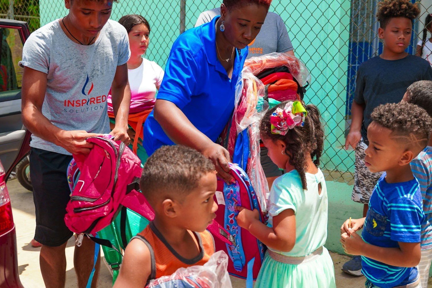 The Inspired Team providing backpacks and school supplies in the Dominican Republic.
