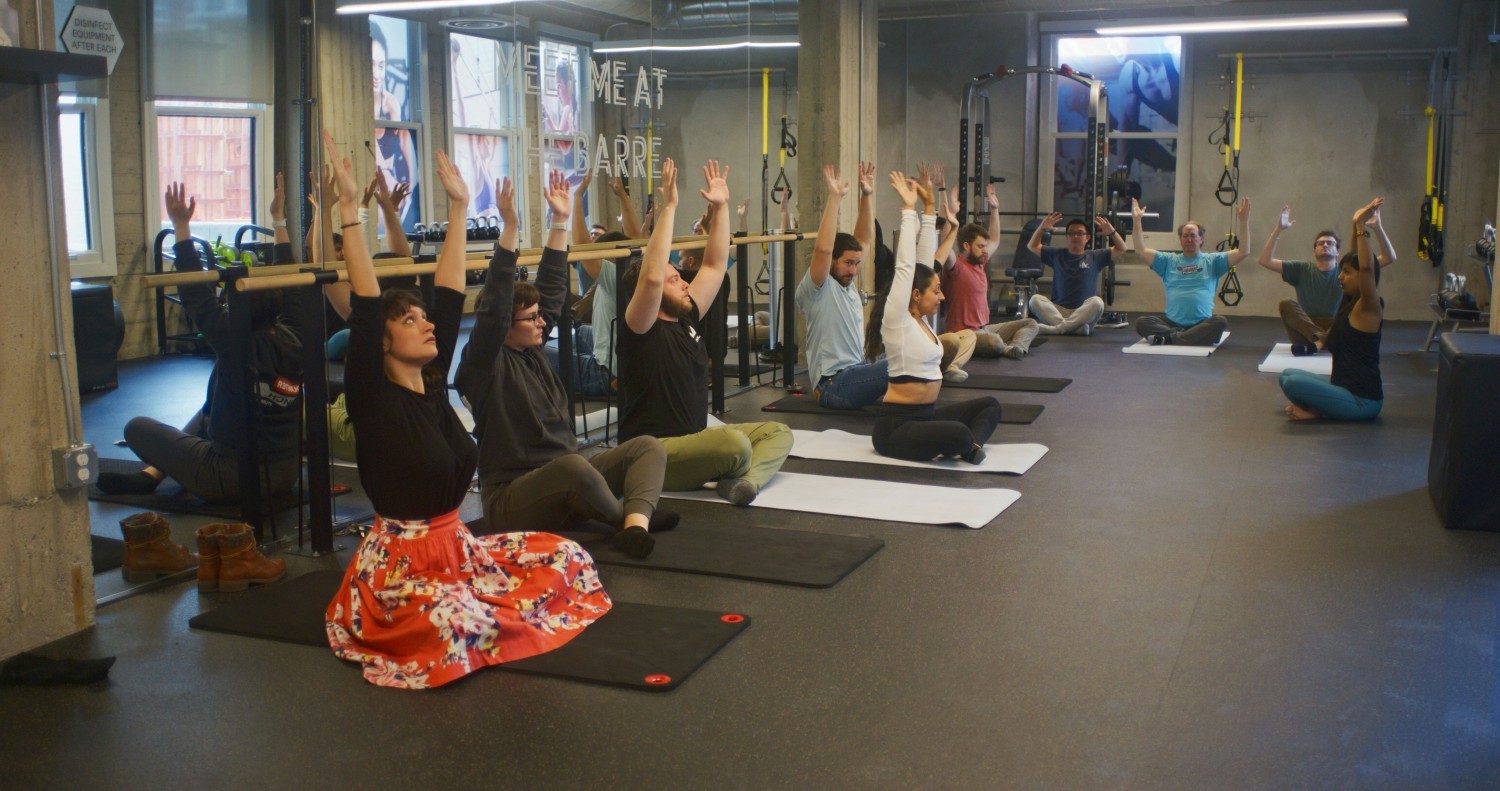 Focusing on mental & physical well-being- practicing yoga!