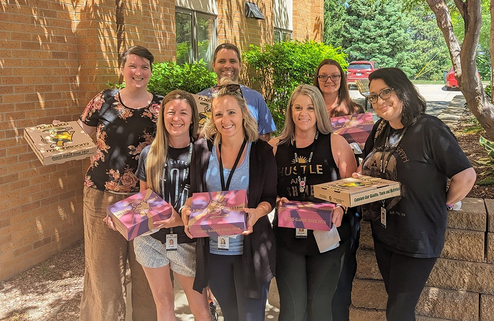 TELCOR teams enjoy being together for a company-provided lunch, spending time outside the office to build relationships.