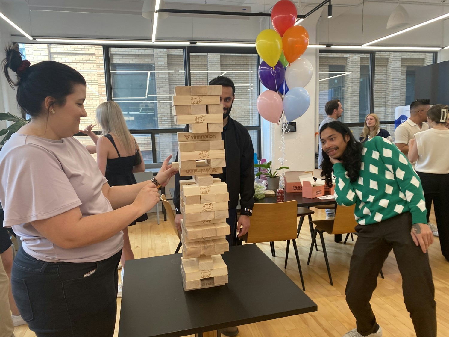 Employees enjoying a Viral Nation Pride Month social event