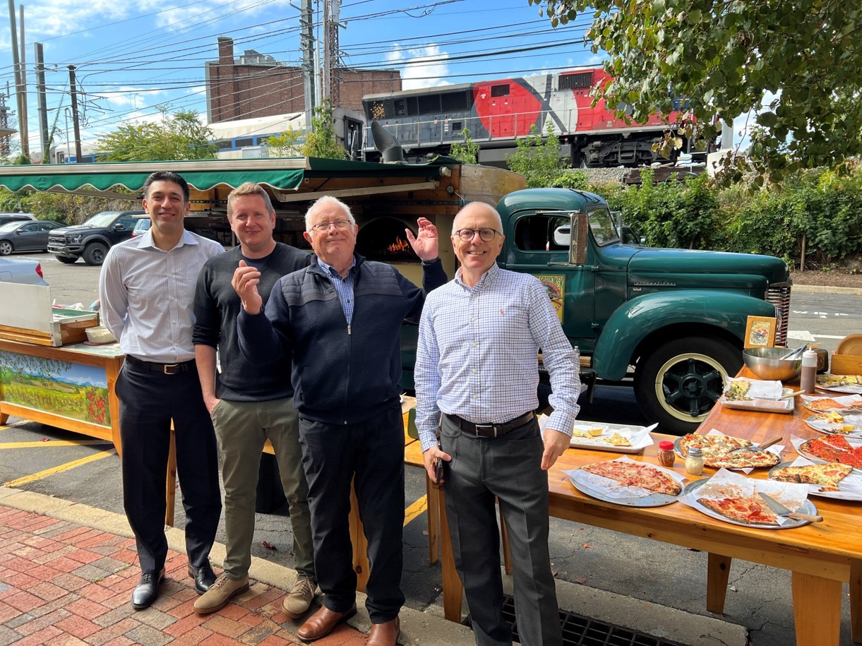 Celebrating the visit of our colleagues with perfect pizzas from The Big Green Pizza Truck.