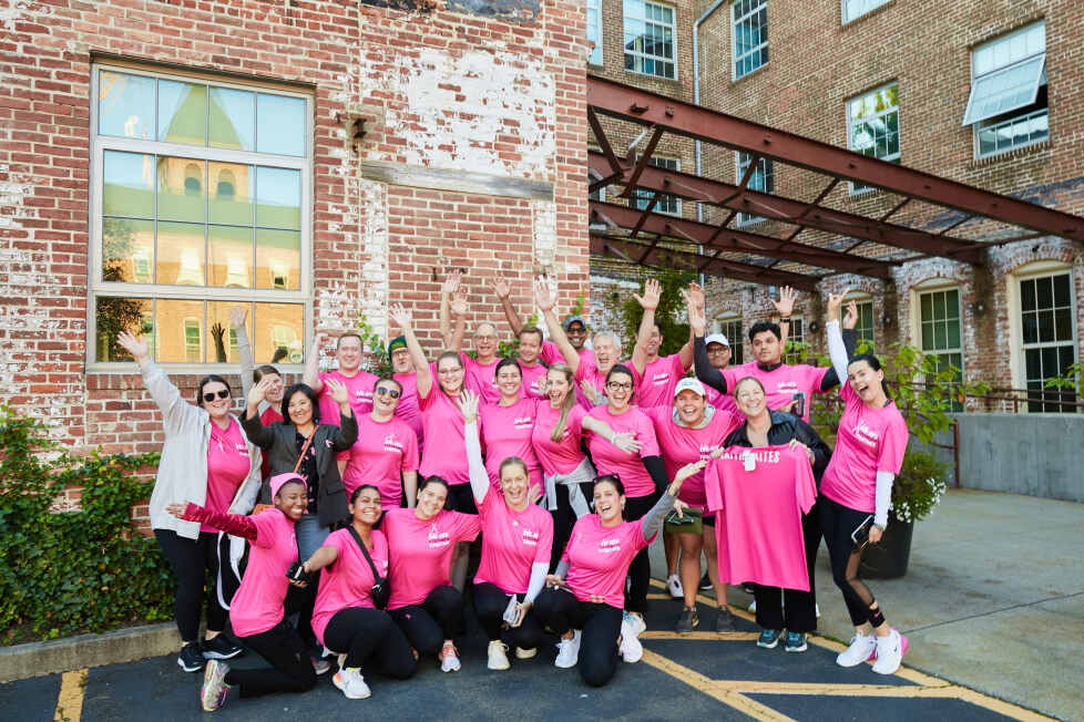 Hitting the ground running and walking to show our support for those impacted by breast cancer at our employee 5K event.