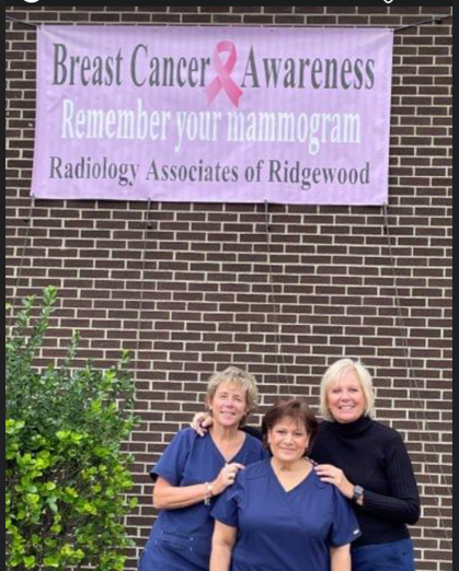 Our team getting involved with patient education and marketing of Breast Cancer Awareness Month