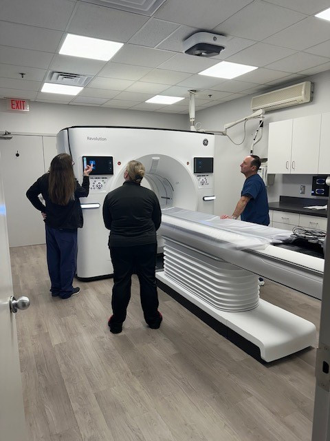 CT team learning about our new AI enhanced equipment