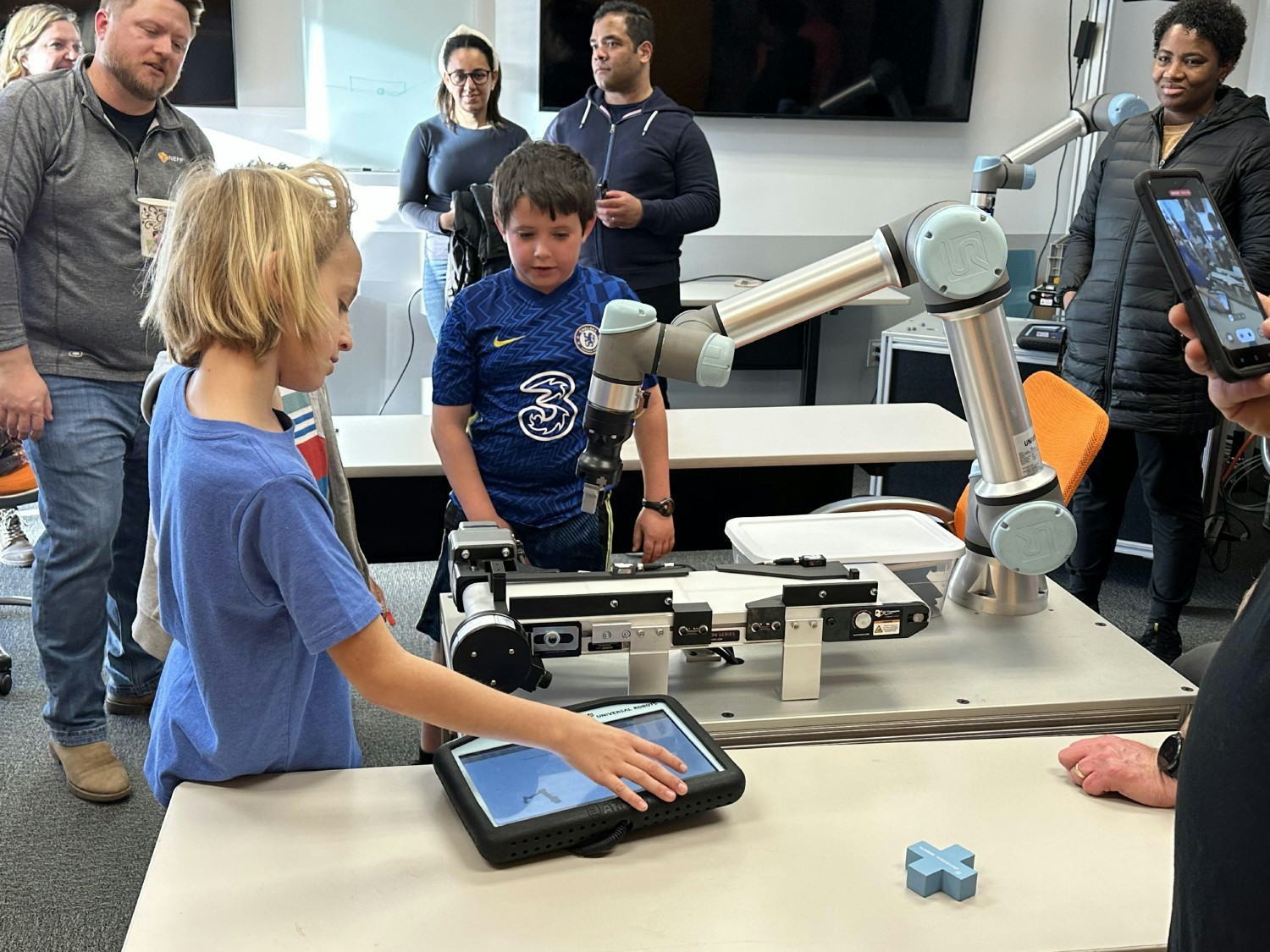 Neff's Robotics Team promotes robotics education to increase knowledge of collaborative robots to elementary children. 