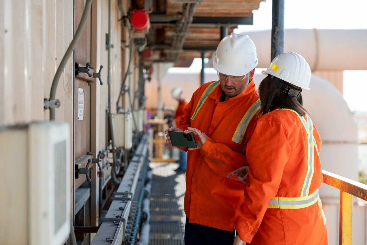 NEFF representatives testing valves on a dust collection system.