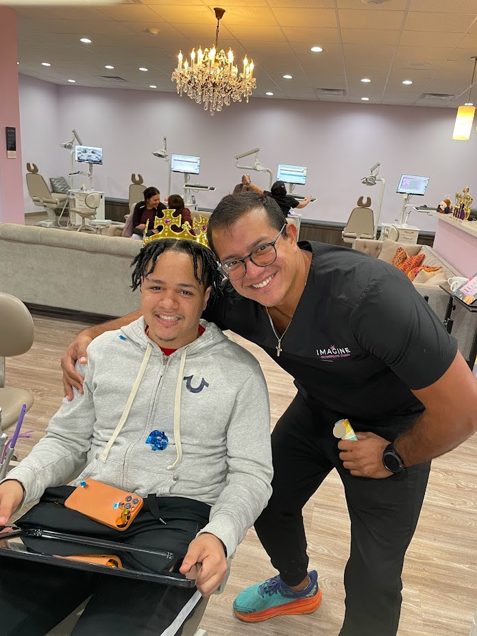 Patients at Imagine enjoy a celebration for their smile wins! Every patient finishing treatment gets a crown and gifts.