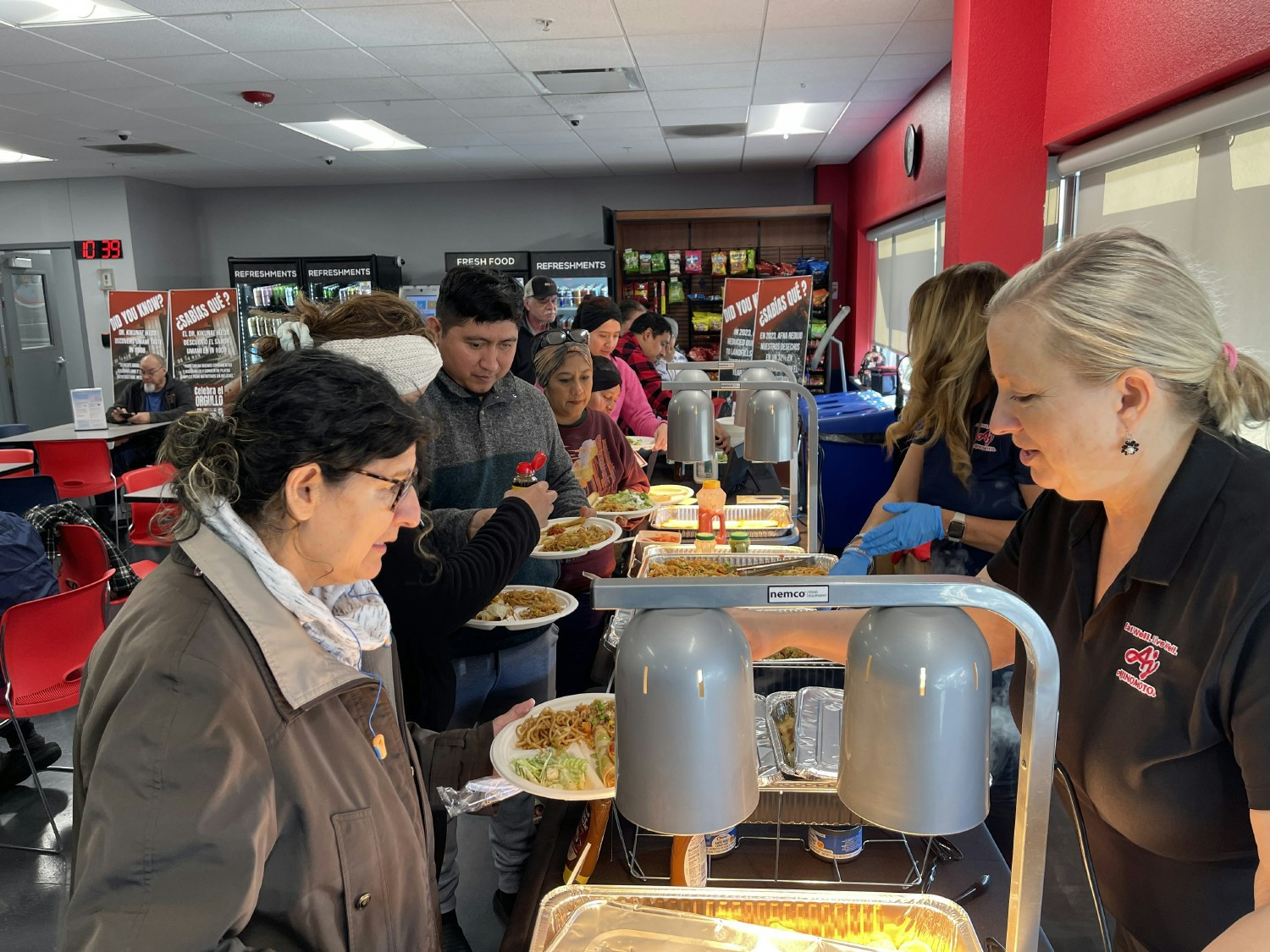 Employees enjoy a product tasting event, bringing our value of Sharing the Joy of Food to life across all locations.
