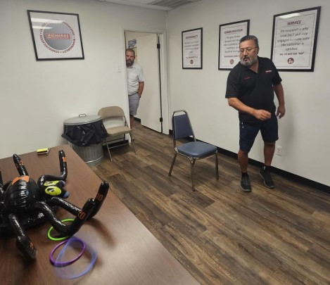 Leg-A-Lasso, one of our Temple associates ringing a spider leg.