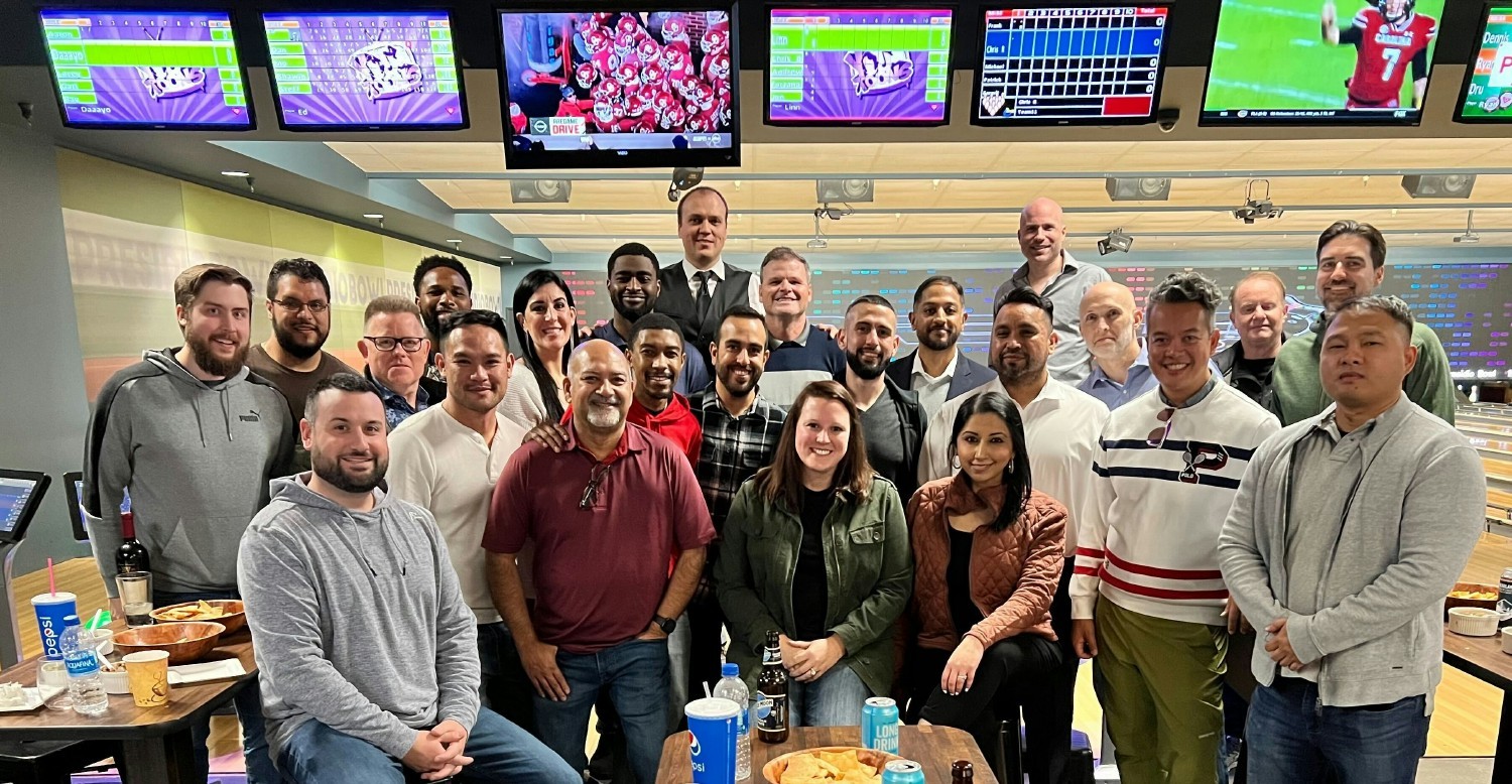 Bowling during our annual holiday weekend team building event.