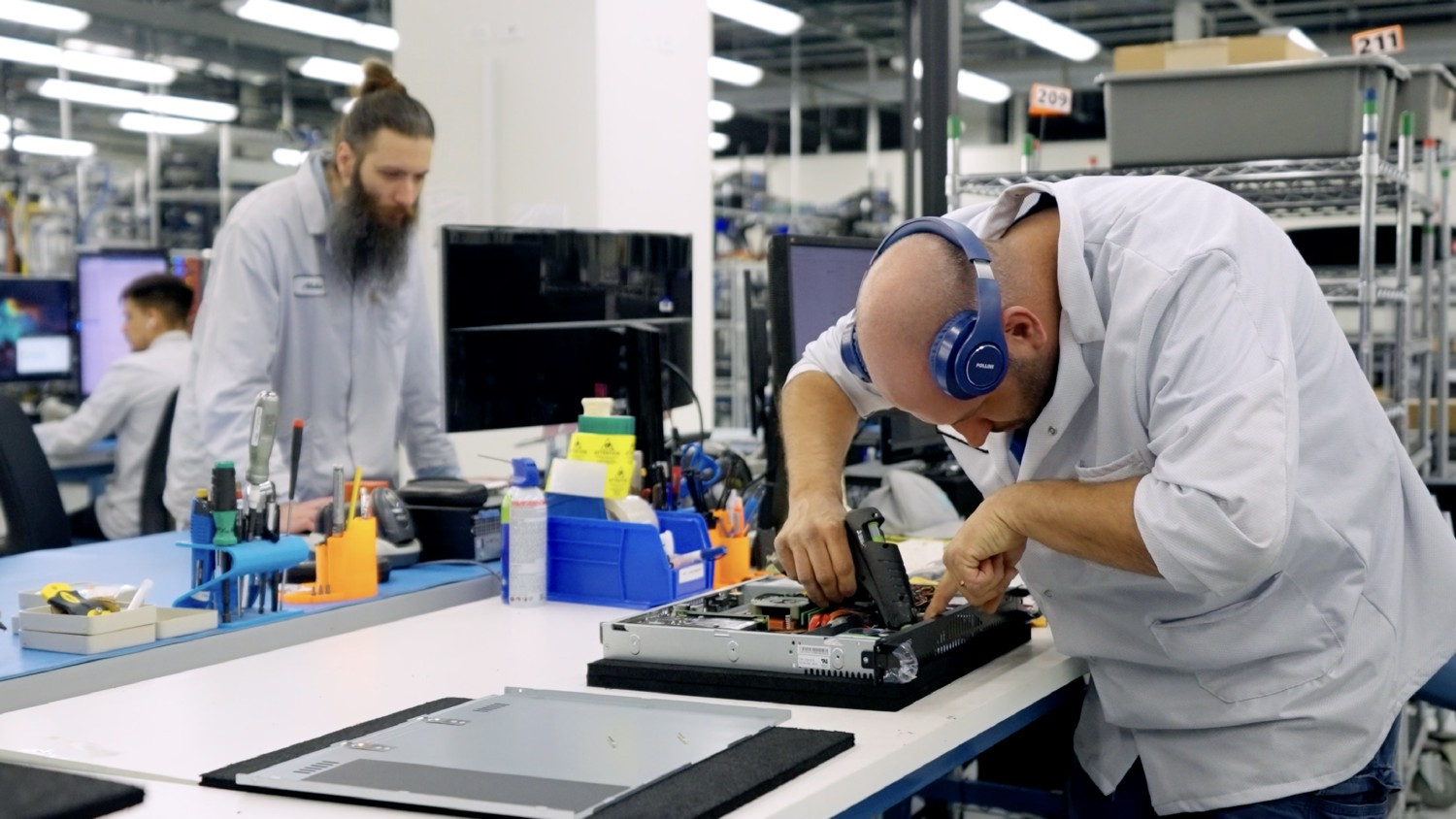 Members of our Foundry team working on data center rack servers. 