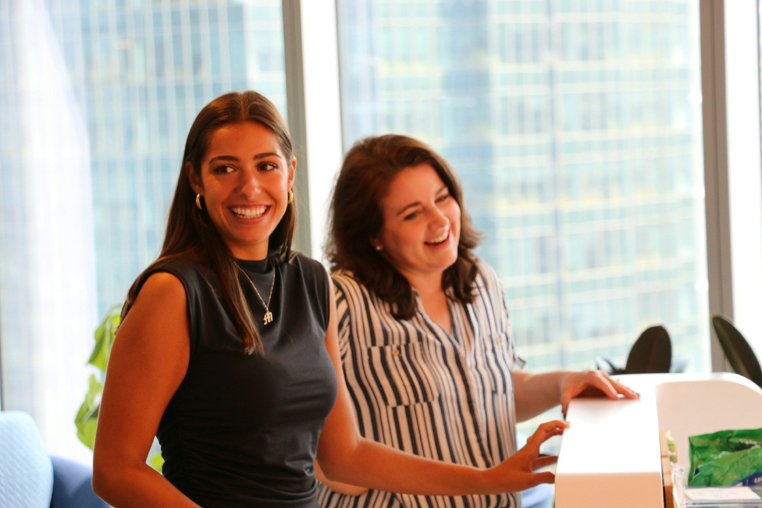 Associates connecting at our front desk. 
