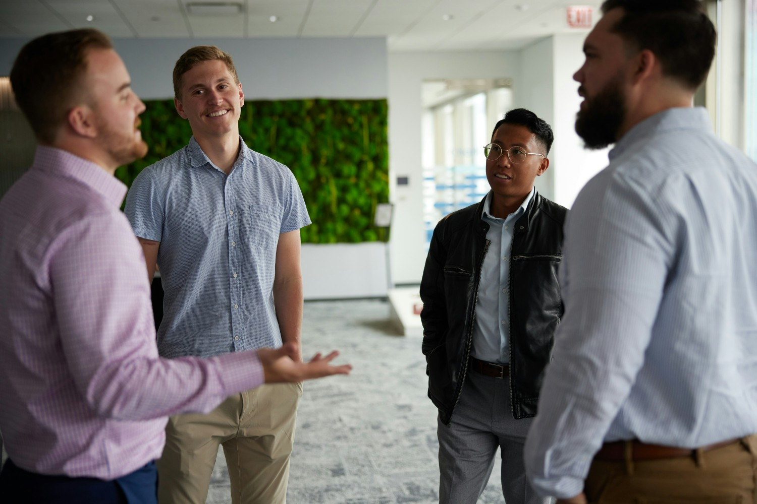 Consultants discussing technical solutions. 