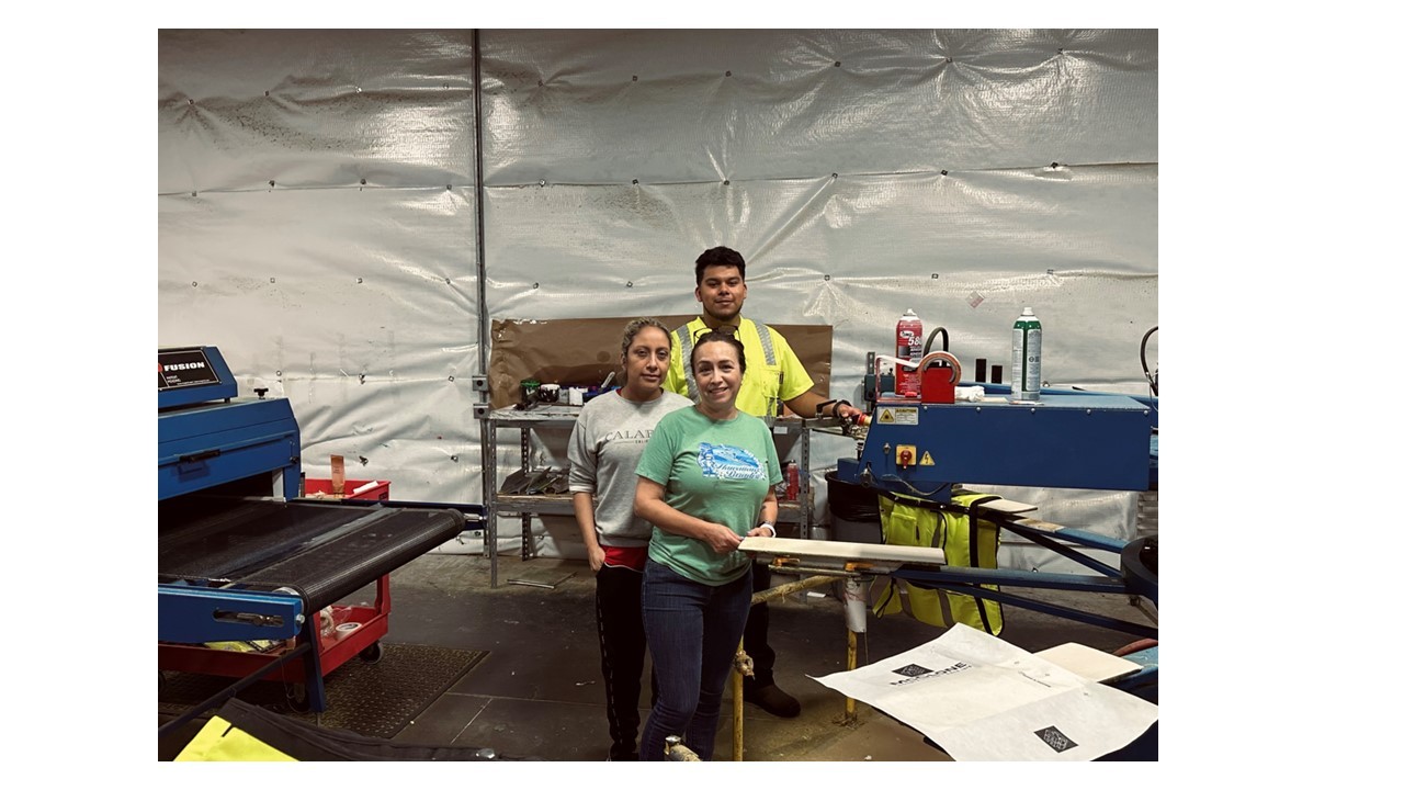 Employees in our art department making it happen.