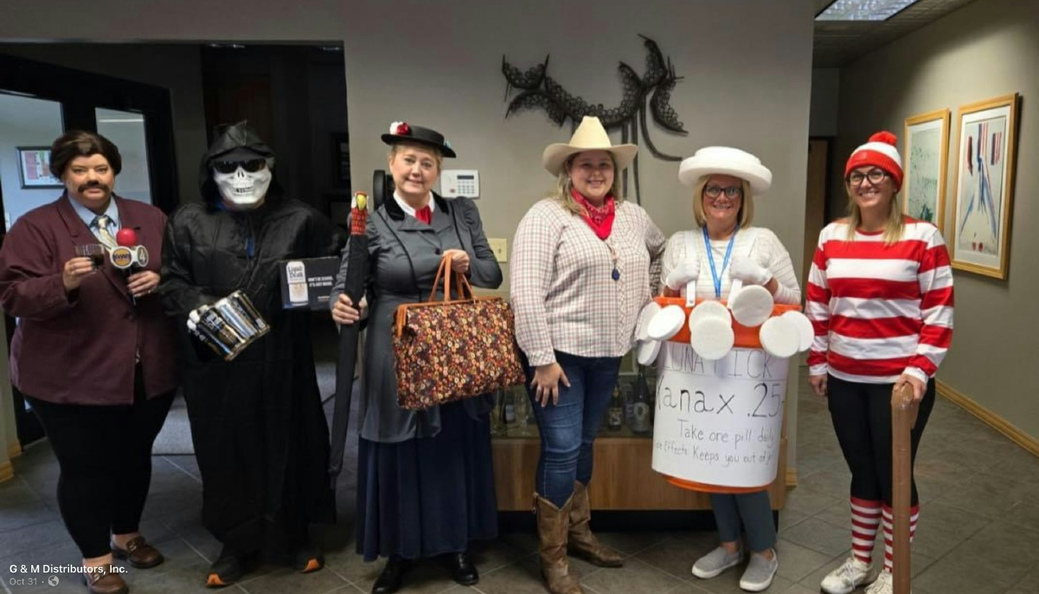 Winners of the G&M Halloween costume contest.