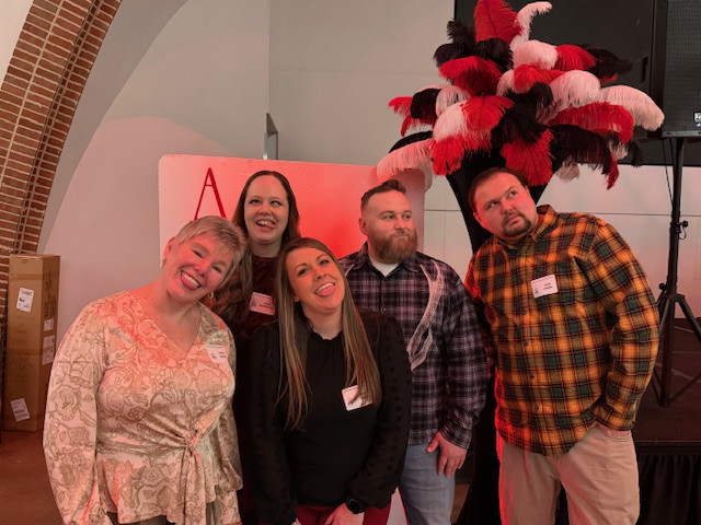 Some of the scheduling team lets off a little steam at the annual company party.