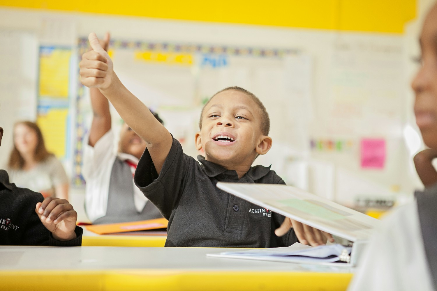 We demonstrate love for our scholars by setting high expectations, embracing their most authentic selves, challenging th