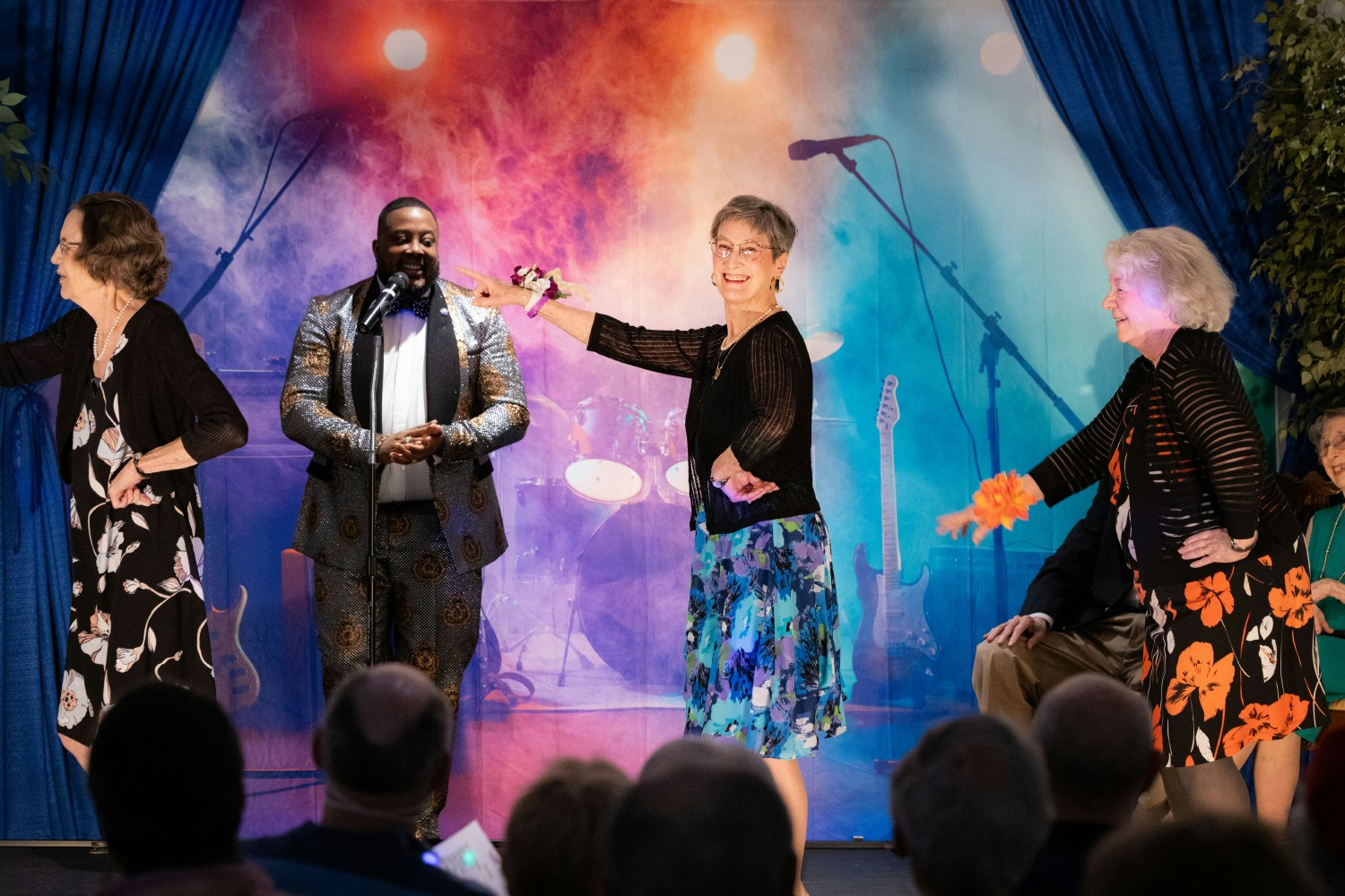 Residents attending theatre show on campus.