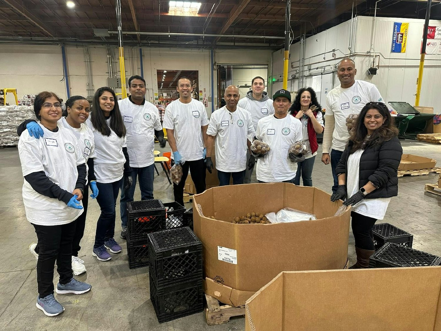 Our Chief Information Officer and team at a food drive giving a little extra back to the community.