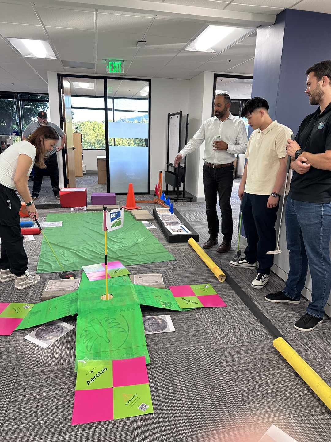 Creativity meets competition! Teams come together to create the best mini putt holes for the annual Gutter Putter event.