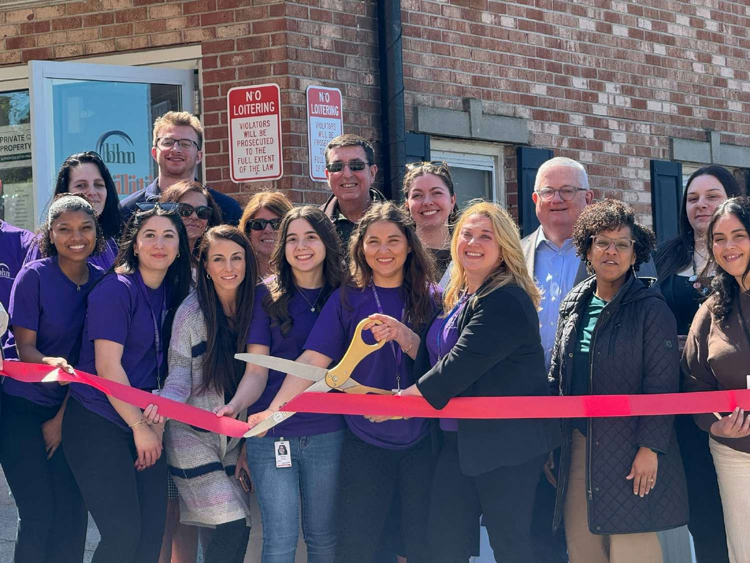 Staff and community celebrate together the opening of a new Abilities facility for autism support services