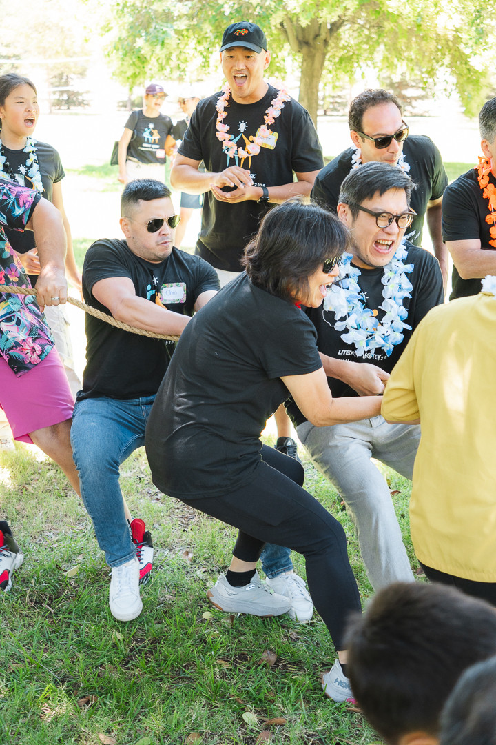 We're a fun group with a competitive side! It was a true team effort to win this game of tug of war!