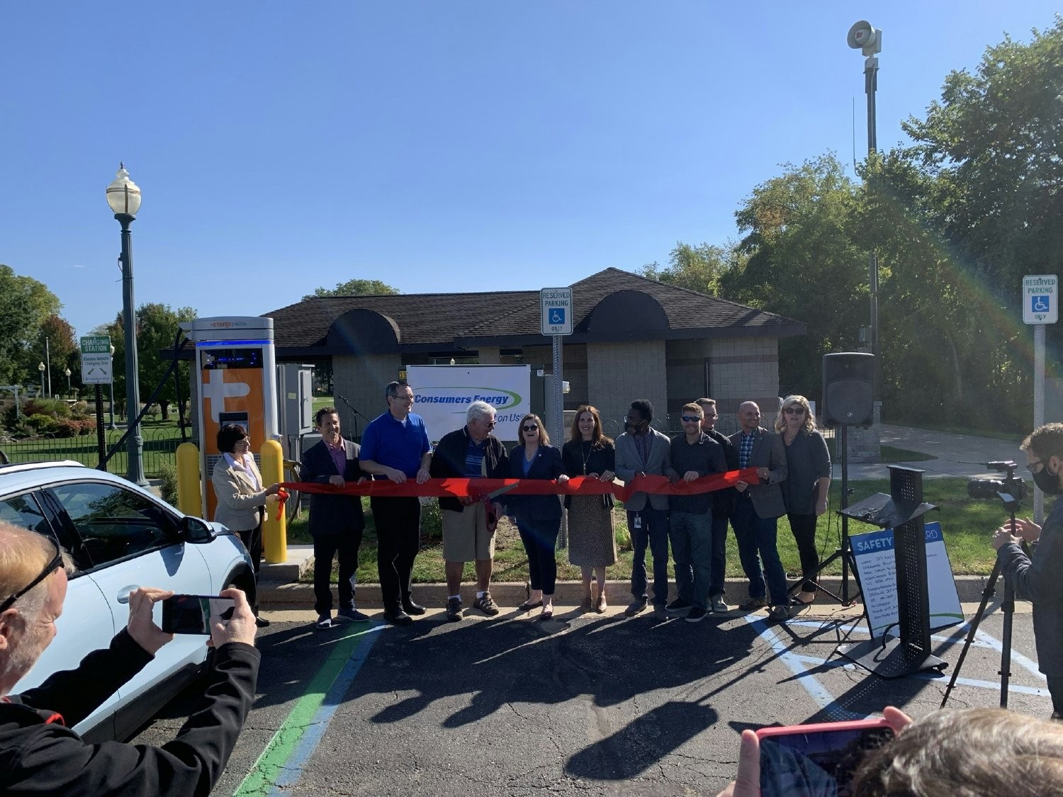 Sam DiNello, CEO, celebrating the launch of the first EV charger within the community of our completed project.