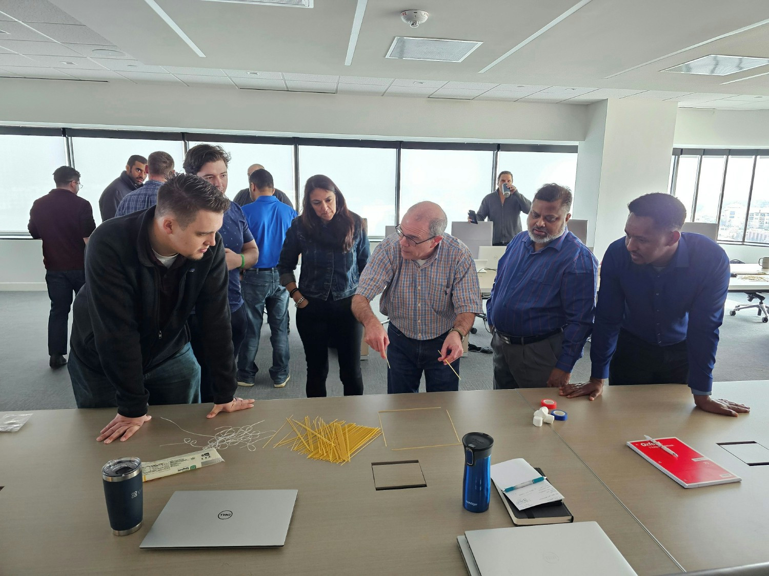 Building with spaghetti! Our Tech team tackled a pasta tower challenge, mixing strategy, collaboration, and laughter!