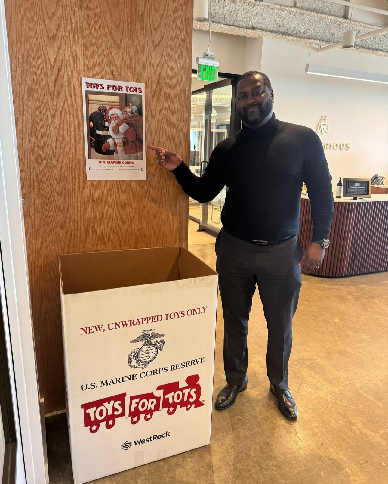 Giving back to our community by participating in Toys for Tots every year.