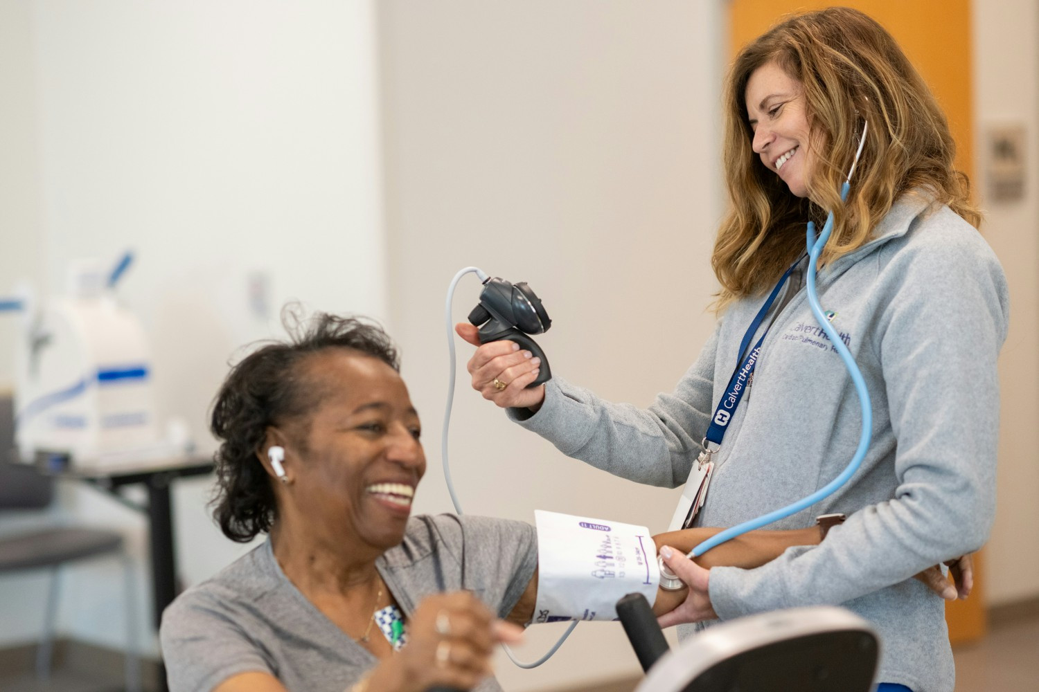 Dedicated to Your Health: A CalvertHealth team member checks a patient’s blood pressure with care and precision.